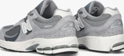 grijze new balance lage sneakers gc2002