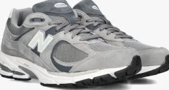 grijze new balance lage sneakers 2002r m