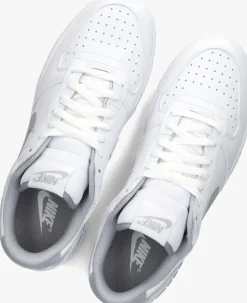 grijze nike lage sneakers big nike low