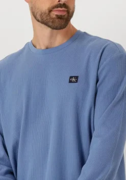 lichtblauwe calvin klein trui ls waffle badge crewnk tee