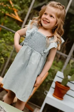 lichtblauwe daily7 mini jurk ruffle dress sleeveless