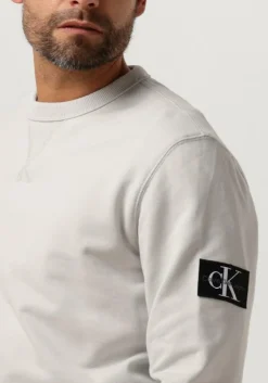 lichtgrijze calvin klein sweater badge crew neck