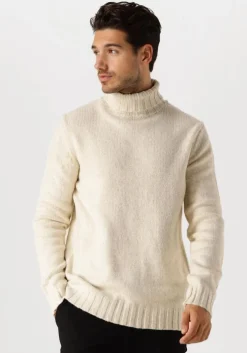 witte dstrezzed coltrui ove turtleneck
