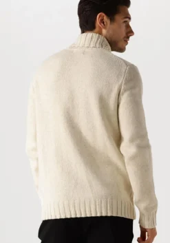 witte dstrezzed coltrui ove turtleneck