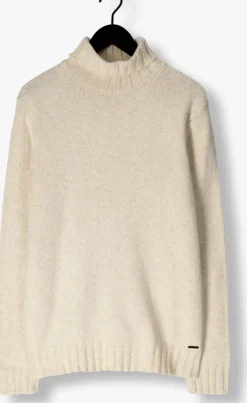 witte dstrezzed coltrui ove turtleneck