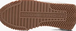 witte michael kors lage sneakers byrdie trainer