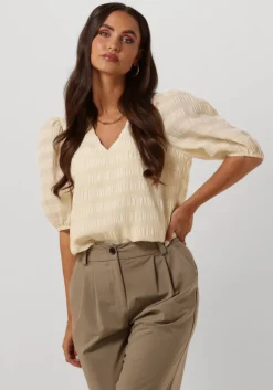 witte modström top dinomd top