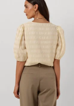 witte modström top dinomd top