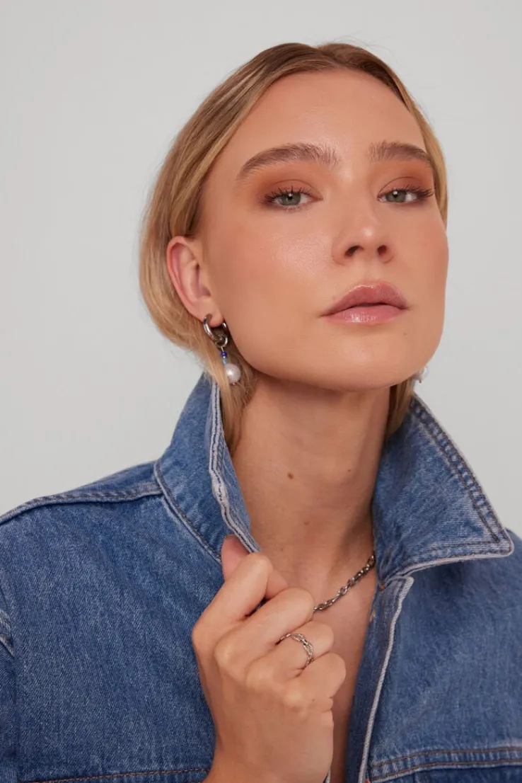 zilverkleurig notre-v oorbellen ss23 earring new collection