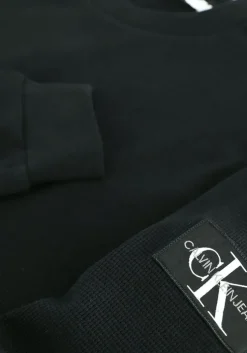 zwarte calvin klein sweater badge waffle ls tee