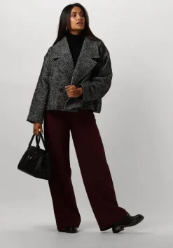 zwarte coccinelle handtas york