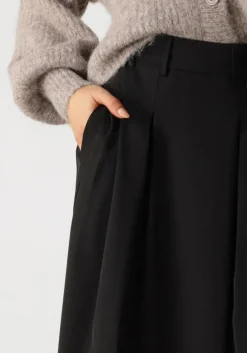 zwarte co'couture midirok anya cc pleat skirt