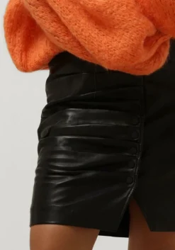 zwarte est'seven minirok est’button skit bunchen